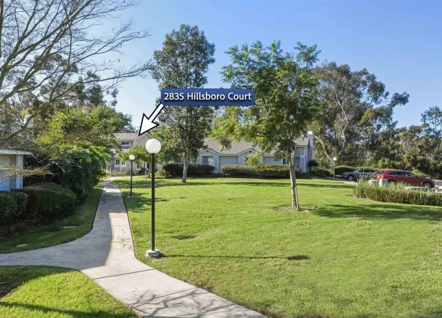 a view of a park with swings