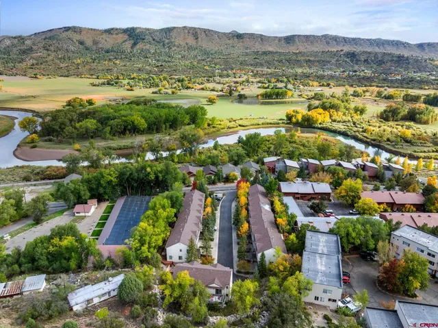 an aerial view of a city with lots of residential buildings