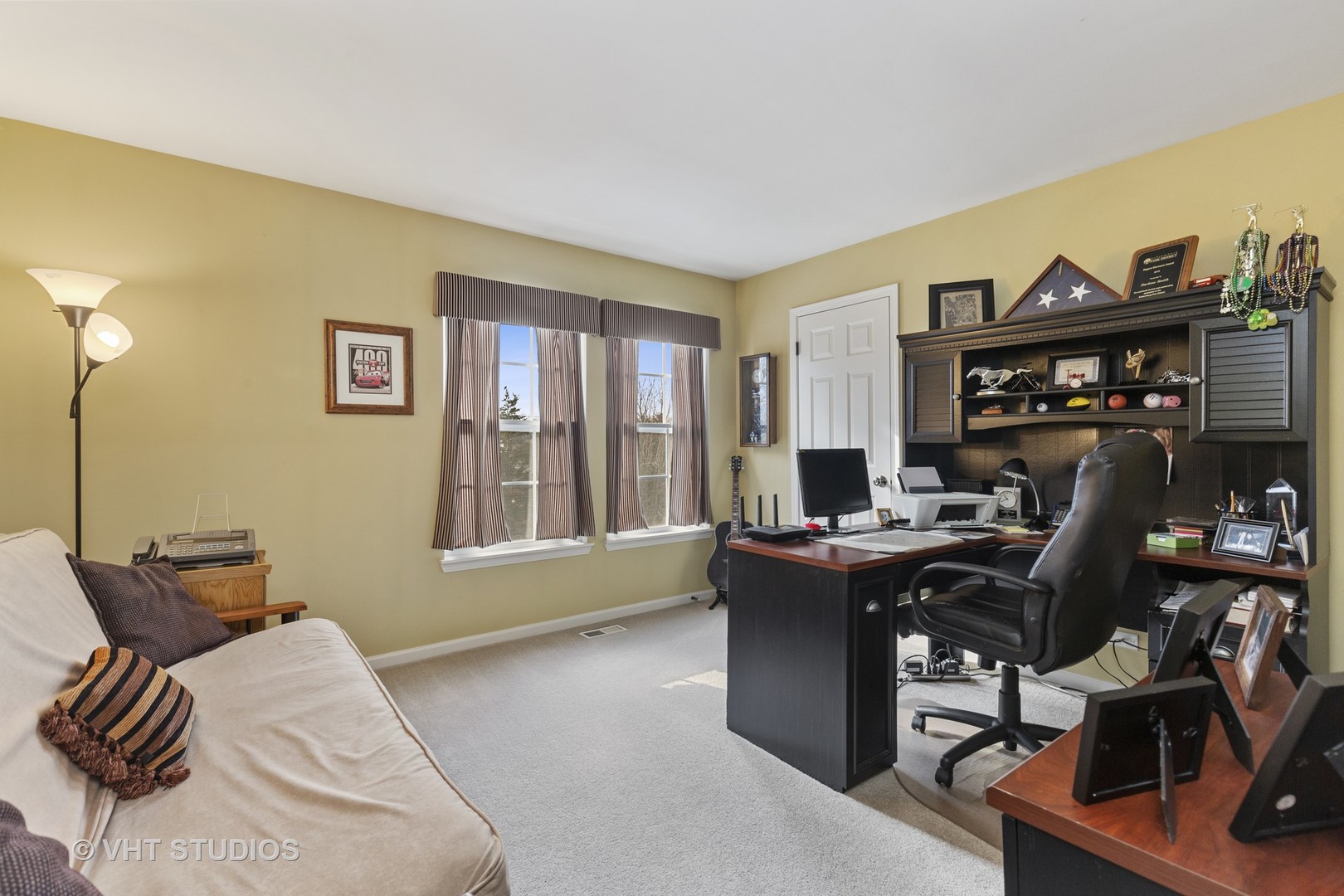 2621 Arbor Drive McHenry, IL 60050 - Photo 19 of 36 a workspace with a couch and a window