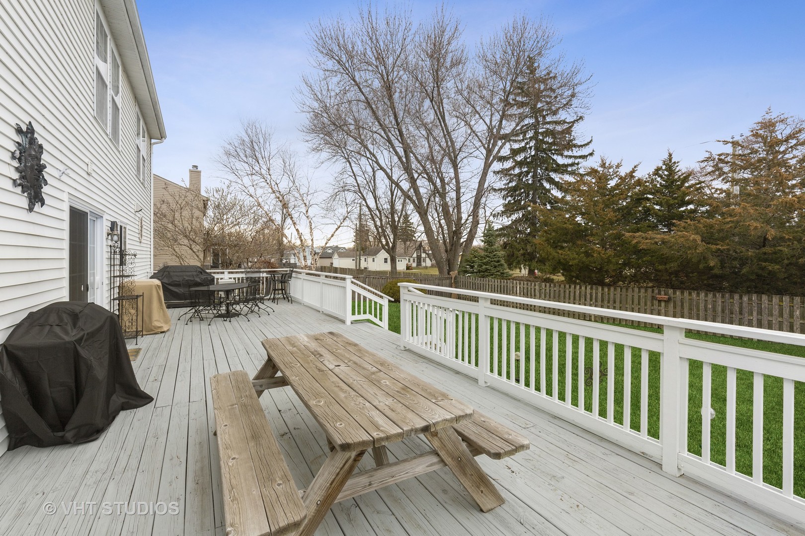 2621 Arbor Drive McHenry, IL 60050 - Photo 3 of 36 a view of balcony with wooden floor and outdoor seating