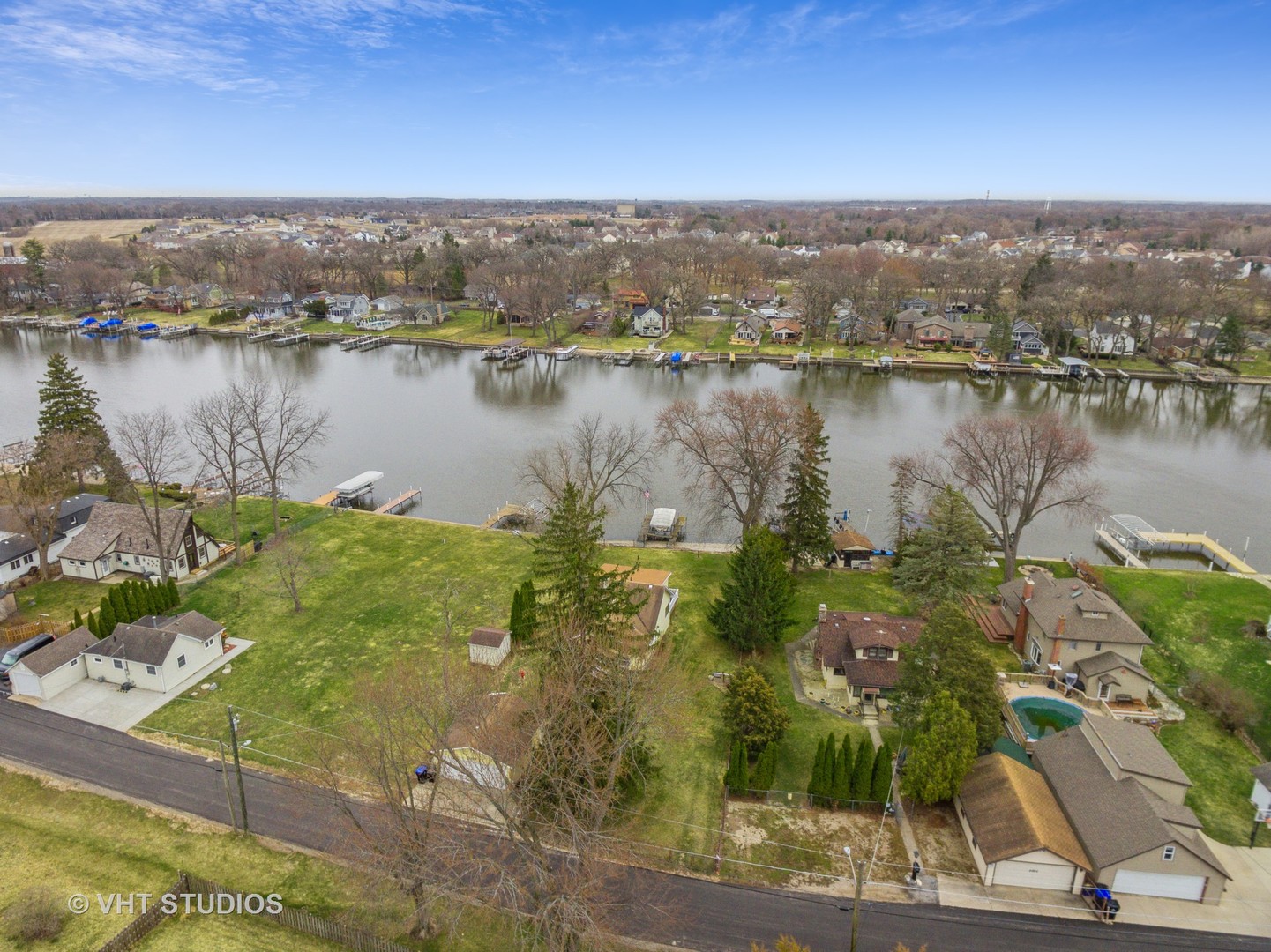 2621 Arbor Drive McHenry, IL 60050 - Photo 29 of 36 a view of a lake with a city
