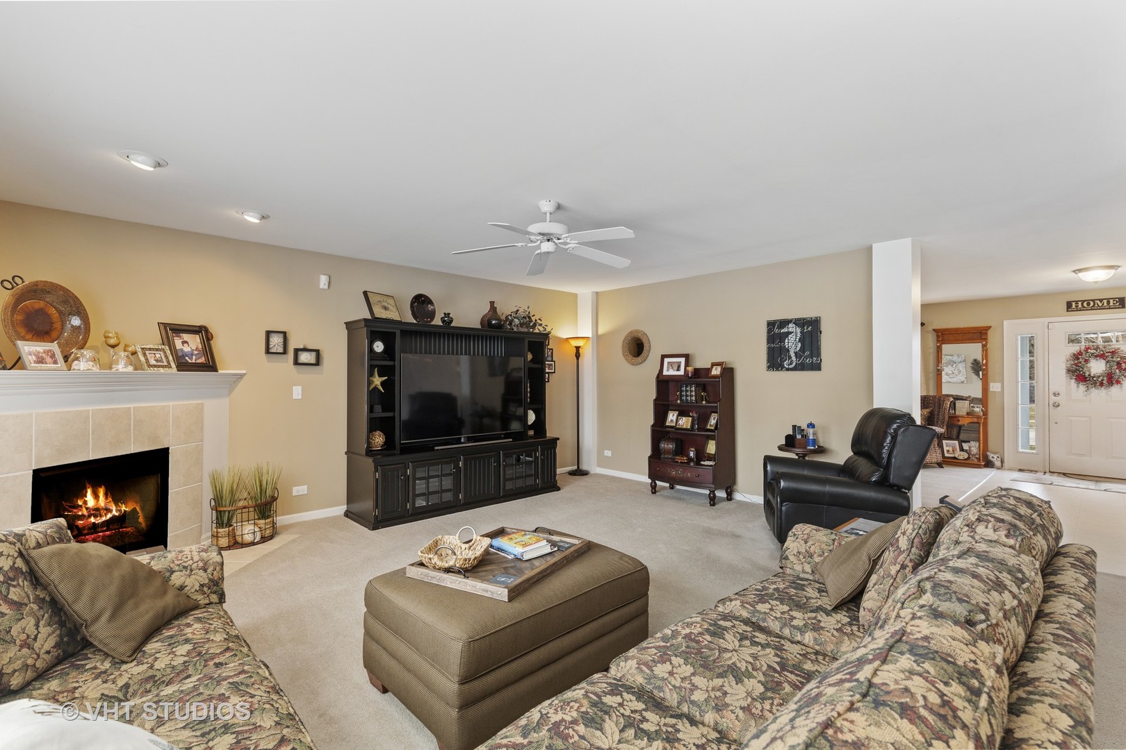 2621 Arbor Drive McHenry, IL 60050 - Photo 7 of 36 a living room with furniture and a flat screen tv