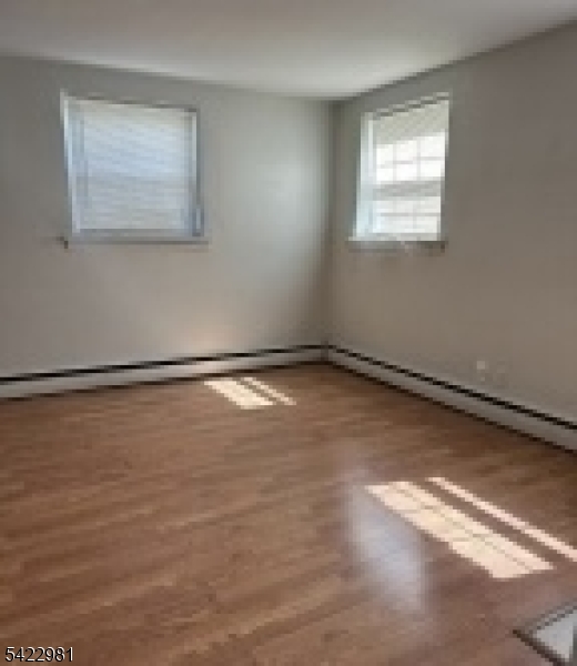 2116 Stanley Terrace, Unit 1 Union, NJ 07083 - Photo 7 of 7 a view of an empty room with a window
