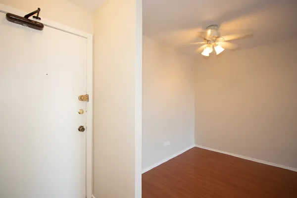 a view of a chandelier fan in a bathroom