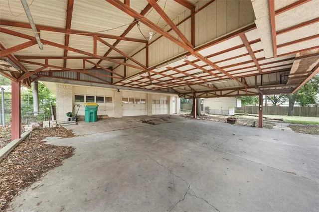 a view of a room with wooden walls
