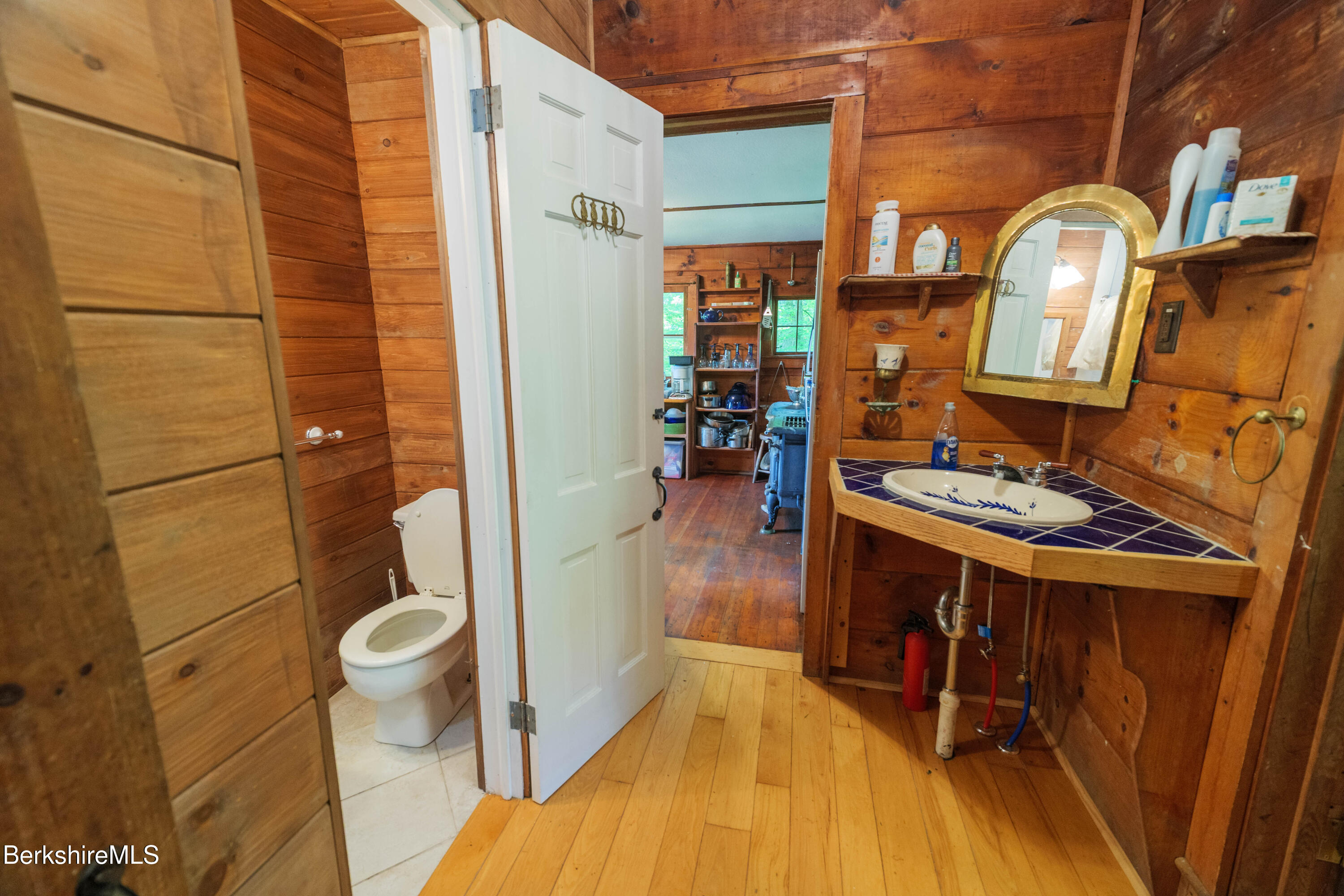 1211 Carpenter Hill Road Pownal, VT 05261 - Photo 8 of 30 a bathroom with a sink and a mirror