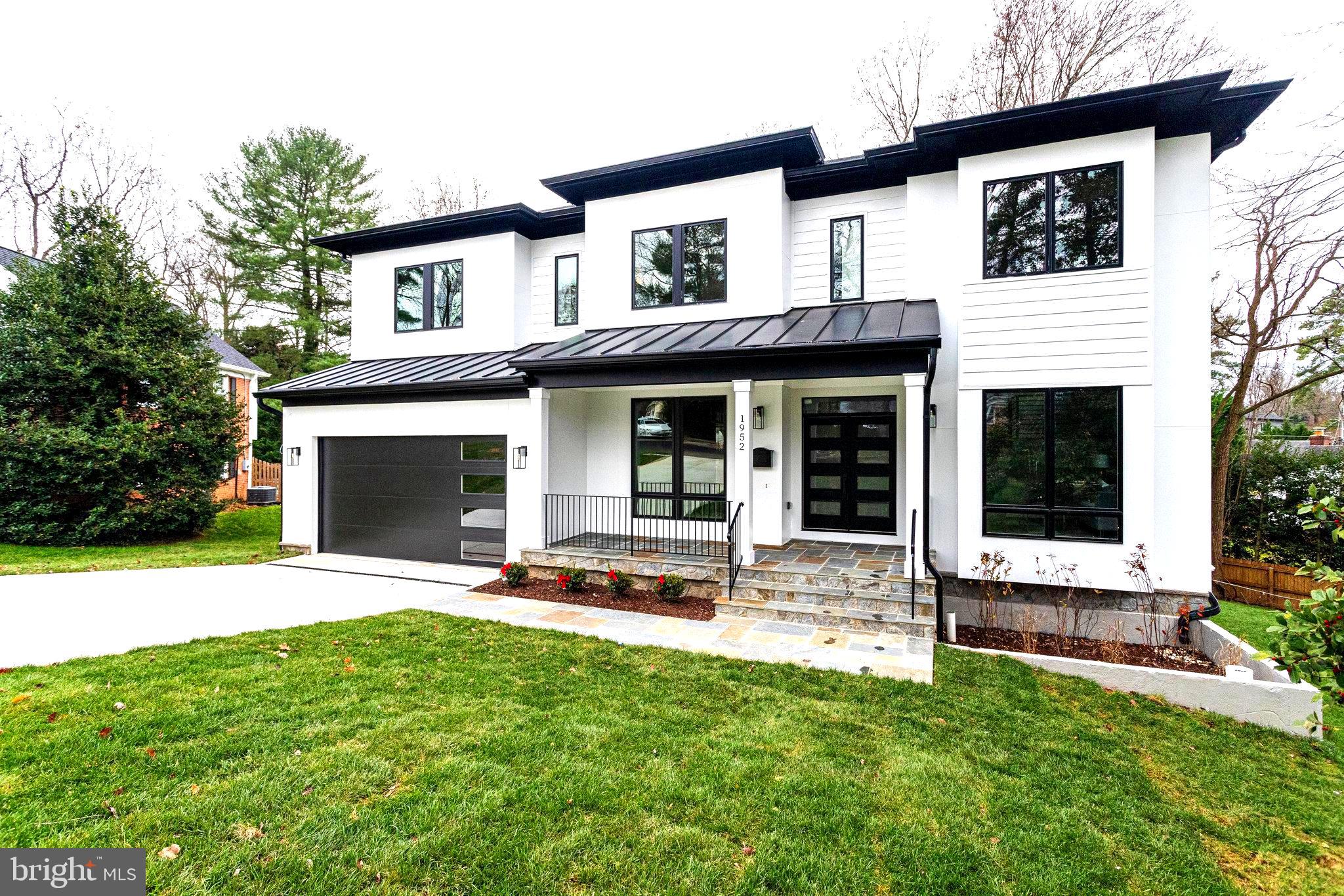 1952 Foxhall Road McLean, VA 22101 - Photo 1 of 99 Front view of the house with driveway