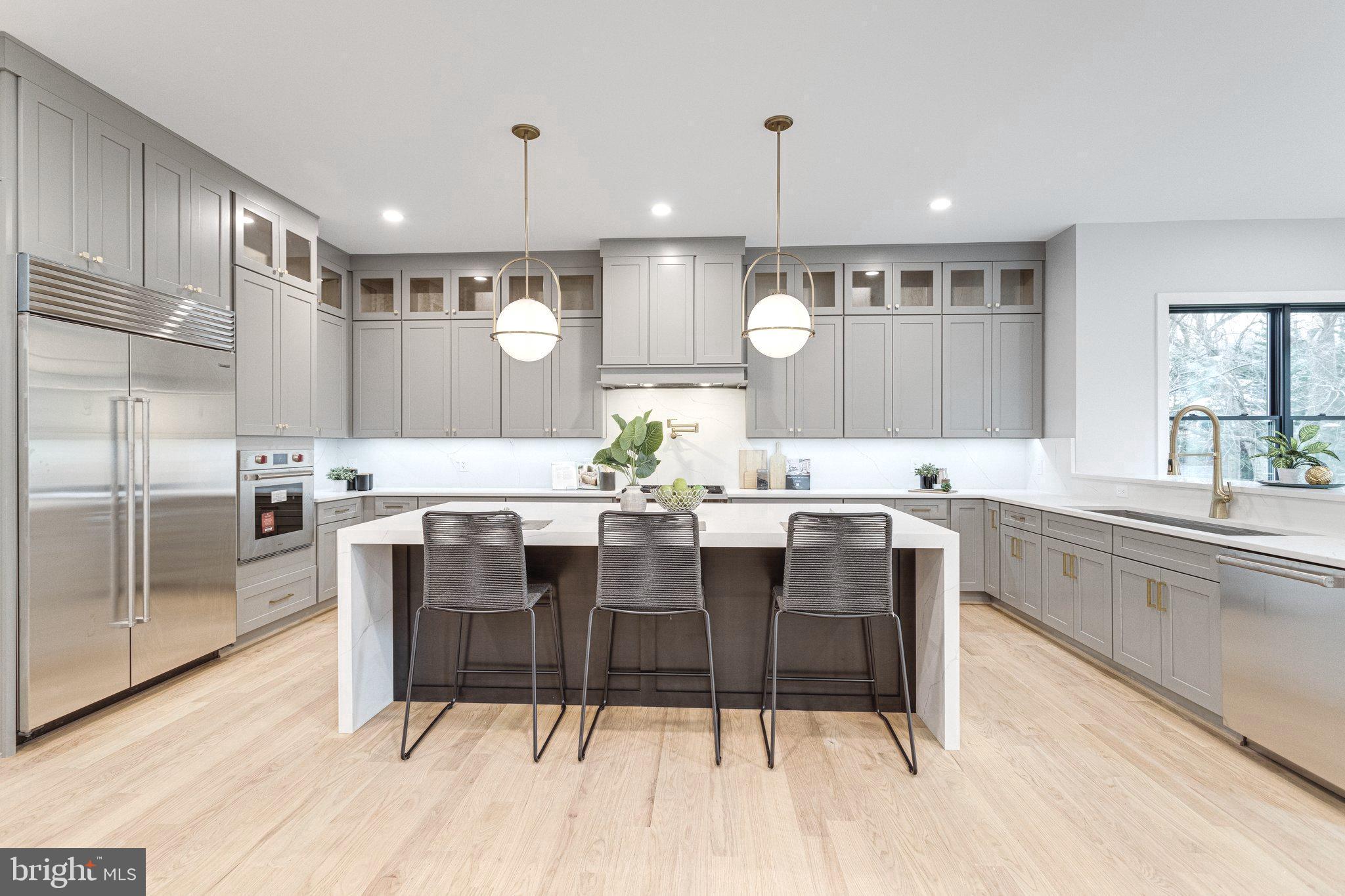 1952 Foxhall Road McLean, VA 22101 - Photo 20 of 99 Large kitchen island with quartz waterfall sides