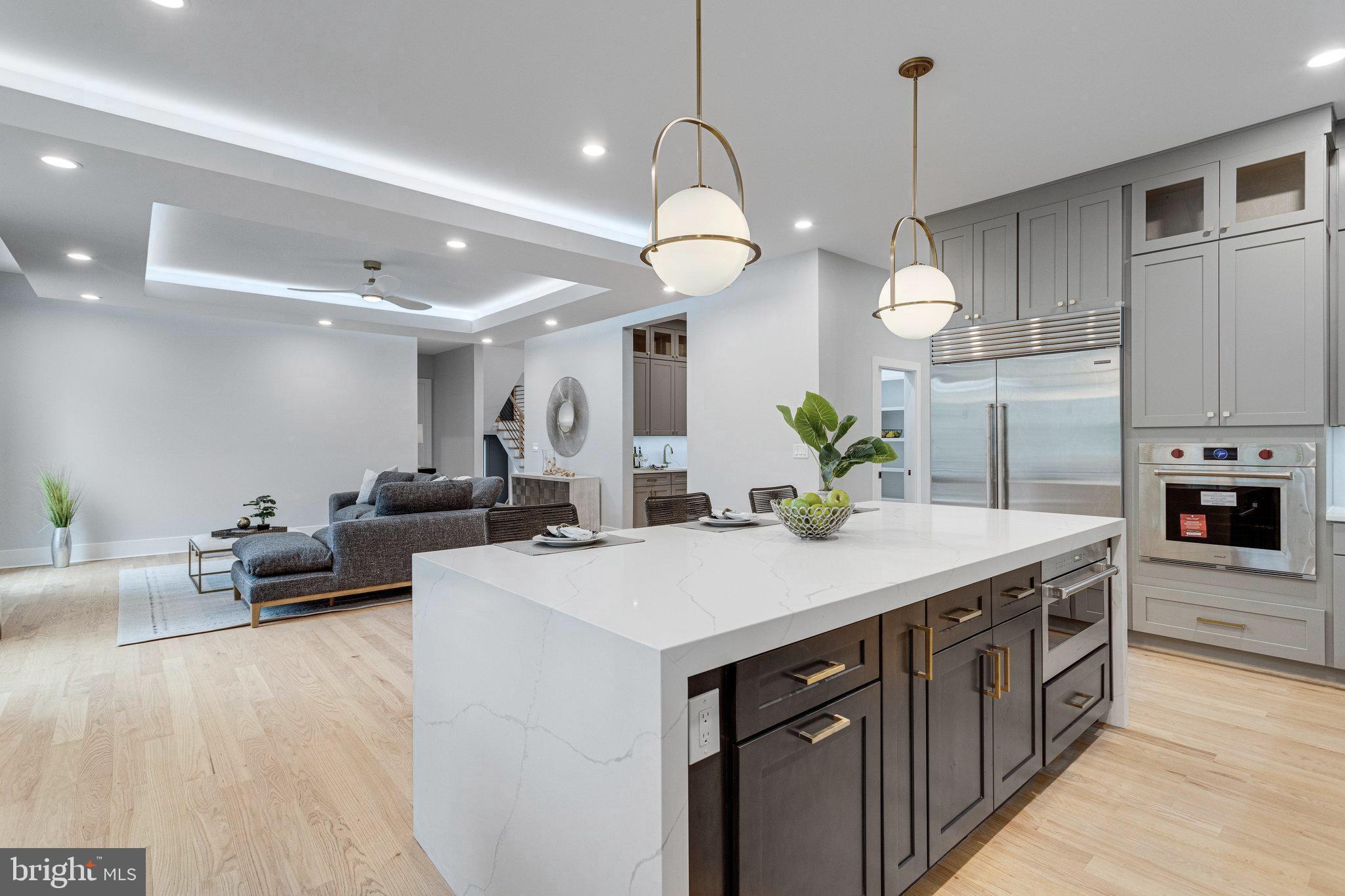 1952 Foxhall Road McLean, VA 22101 - Photo 24 of 99 Large kitchen island with quartz waterfall sides