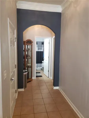 a view of empty room with a fireplace