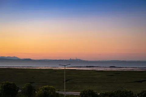 a view of city and mountain