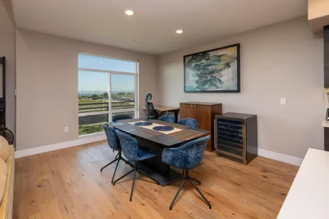a view of a workspace with furniture