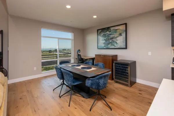a view of a workspace with furniture