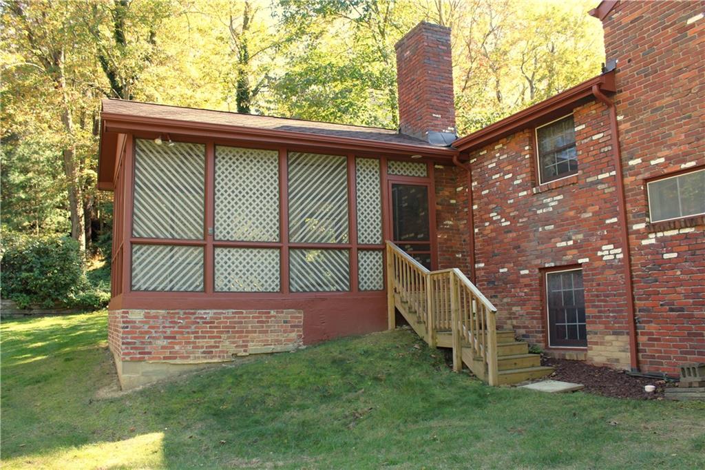 235 Gateshead Drive Canonsburg, PA 15317 - Photo 6 of 9 a view of front door of house with a yard