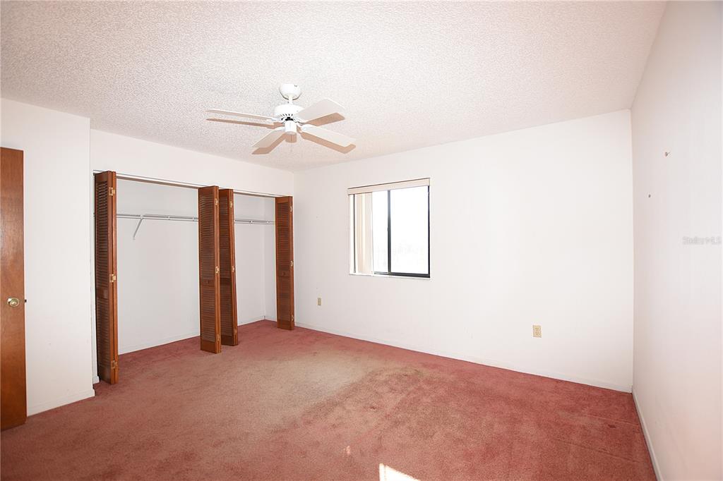 707 Carpenters Way, Unit 45 Lakeland, FL 33809 - Photo 14 of 20 a view of an empty room with a window