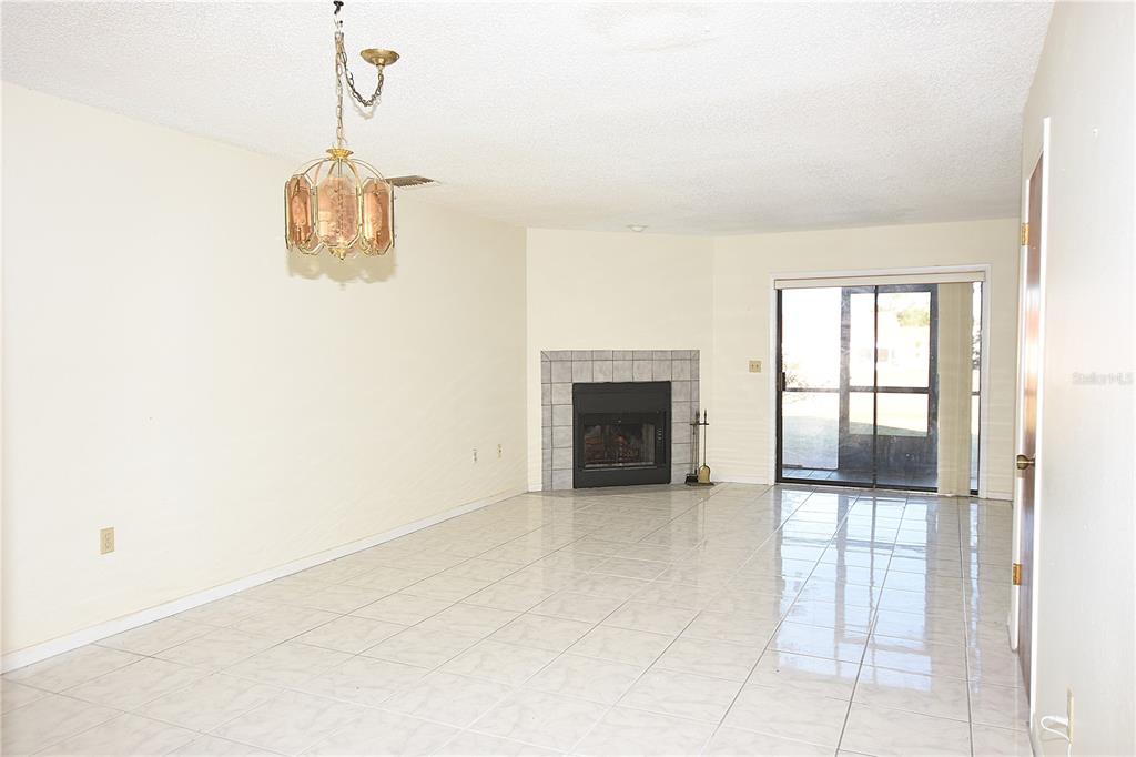 707 Carpenters Way, Unit 45 Lakeland, FL 33809 - Photo 8 of 20 a view of a livingroom with a fireplace