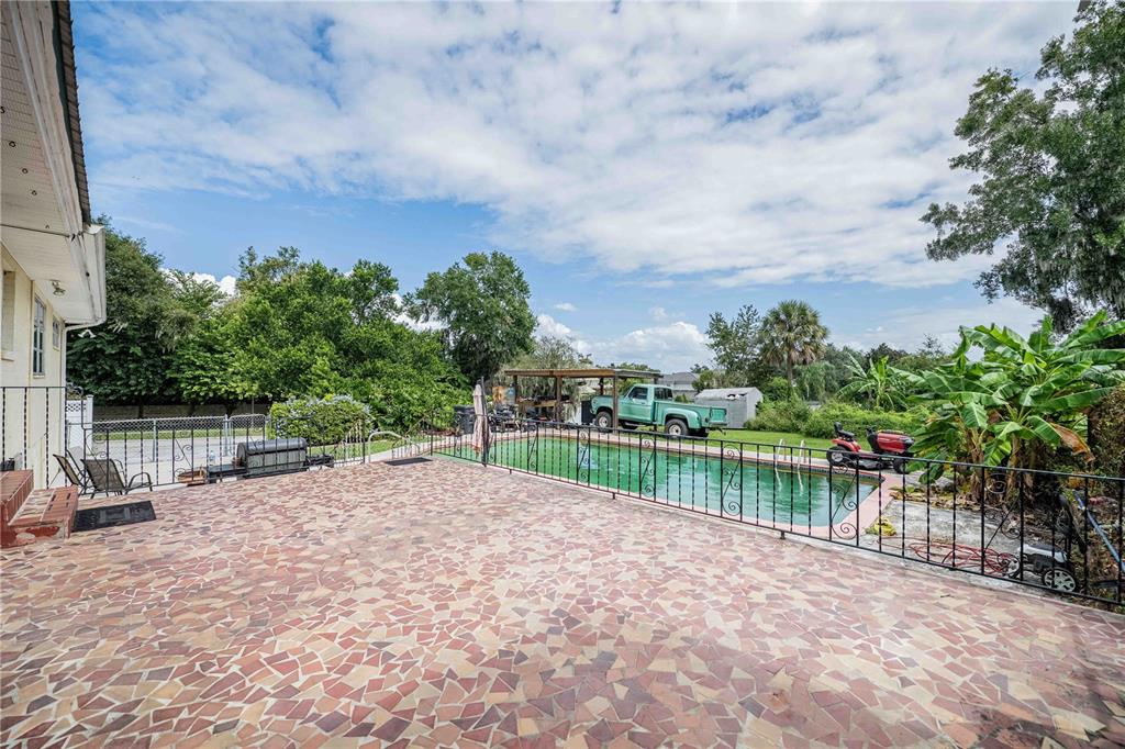 5110 Lakeland Highlands Road Lakeland, FL 33813 - Photo 2 of 40 a view of a lake with a big yard
