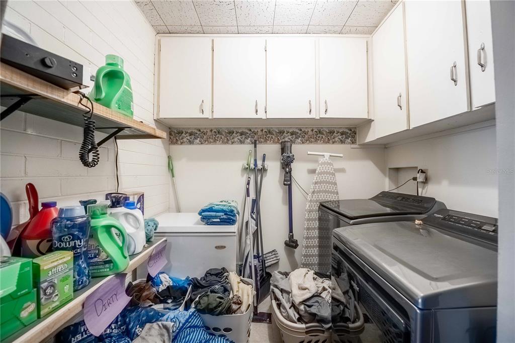 5110 Lakeland Highlands Road Lakeland, FL 33813 - Photo 32 of 40 a room with storage and utility