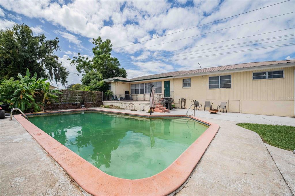 5110 Lakeland Highlands Road Lakeland, FL 33813 - Photo 35 of 40 a view of a swimming pool with chairs