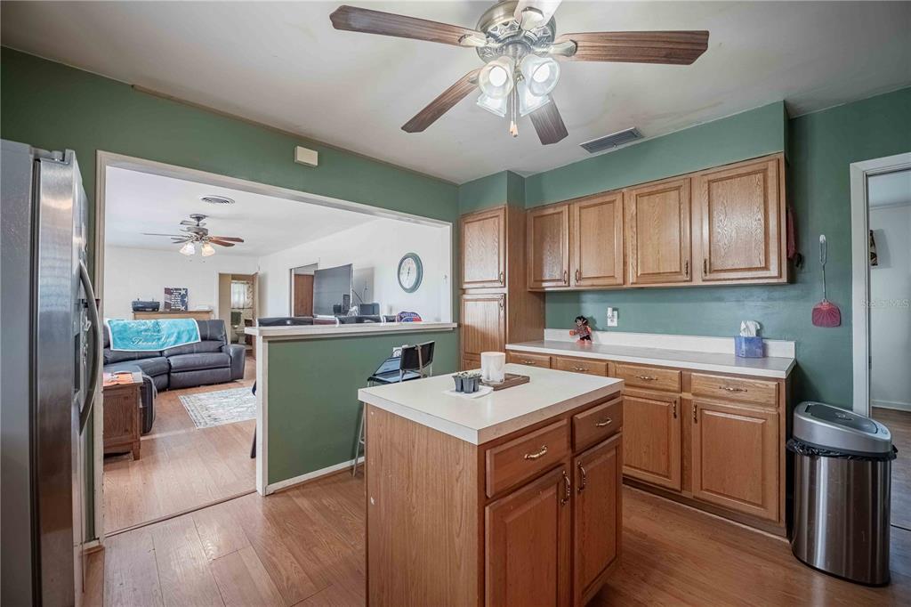 5110 Lakeland Highlands Road Lakeland, FL 33813 - Photo 7 of 40 a kitchen with a sink cabinets and window