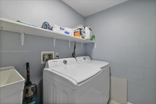 a utility room with dryer and washer