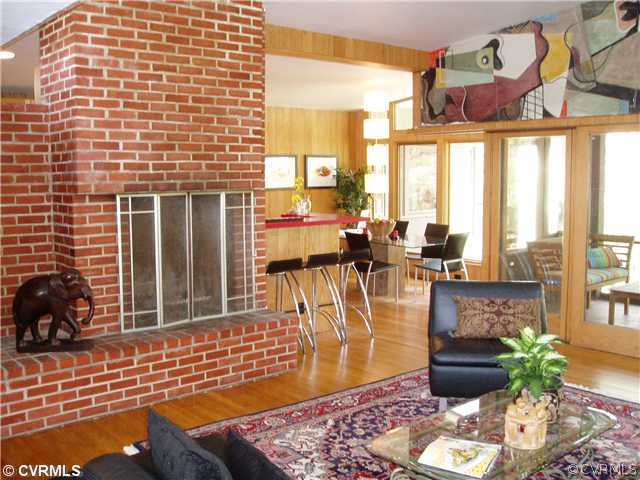 8712 Old Spring Road Richmond, VA 23235 - Photo 3 of 12 a living room with fireplace furniture and a large window