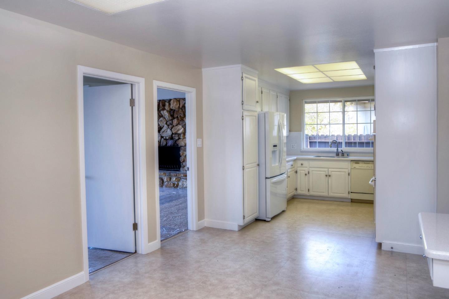 940 Ahwahnee Drive Millbrae, CA 94030 - Photo 11 of 29 a view of a kitchen with refrigerator and a sink