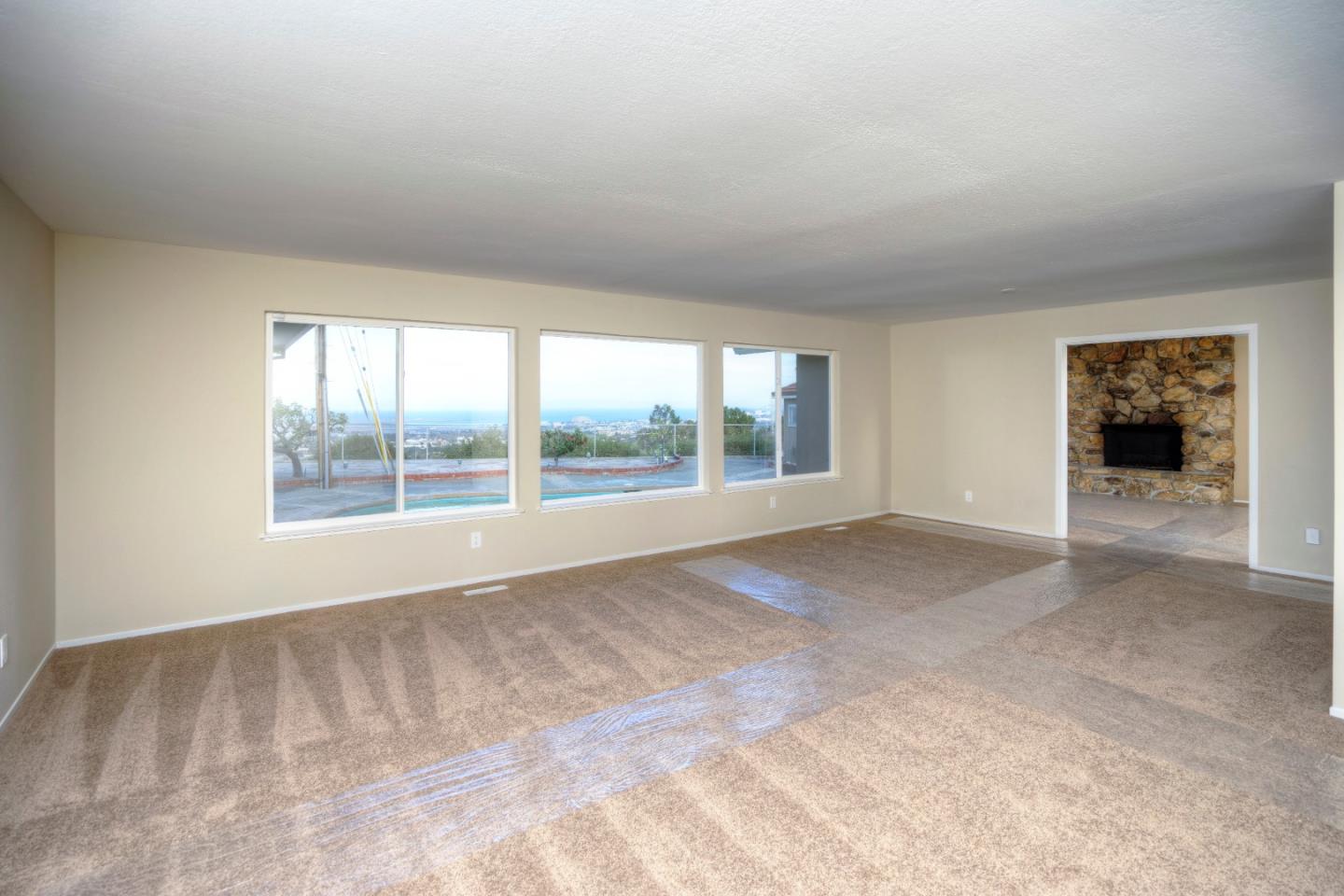 940 Ahwahnee Drive Millbrae, CA 94030 - Photo 12 of 29 a view of an empty room with a window