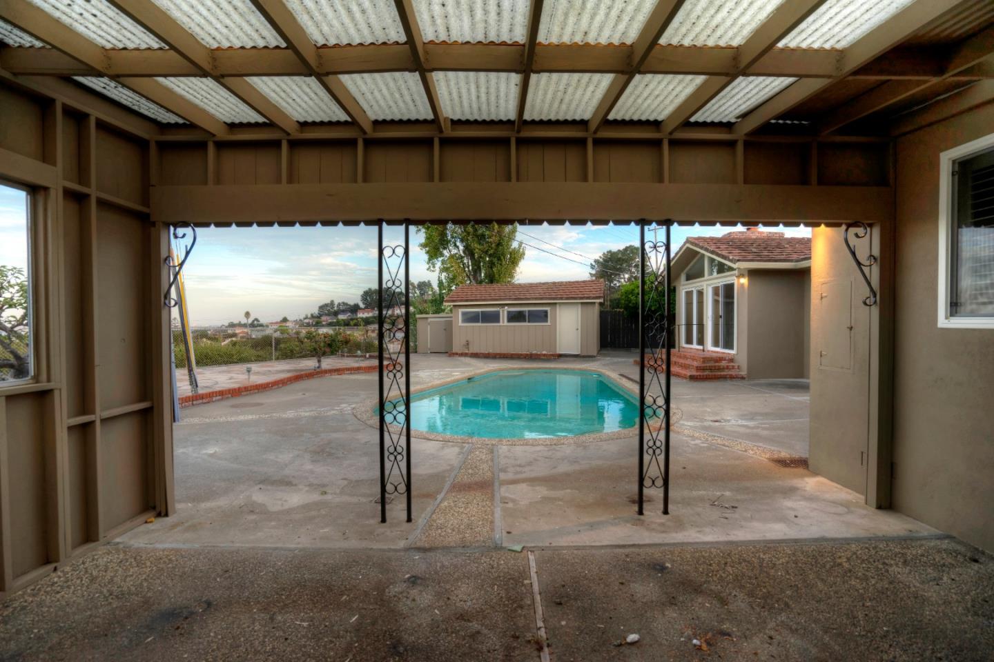 940 Ahwahnee Drive Millbrae, CA 94030 - Photo 18 of 29 a view of a porch with a table and chairs