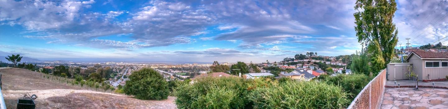 940 Ahwahnee Drive Millbrae, CA 94030 - Photo 21 of 29 a view of a city with lush green forest