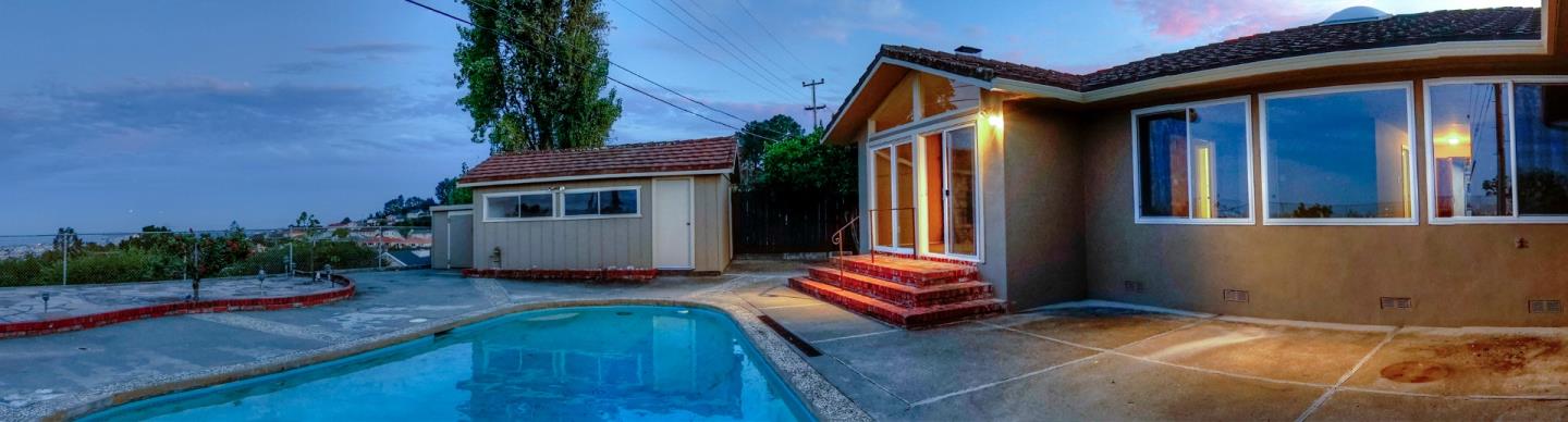 940 Ahwahnee Drive Millbrae, CA 94030 - Photo 24 of 29 a backyard of a house with seating space