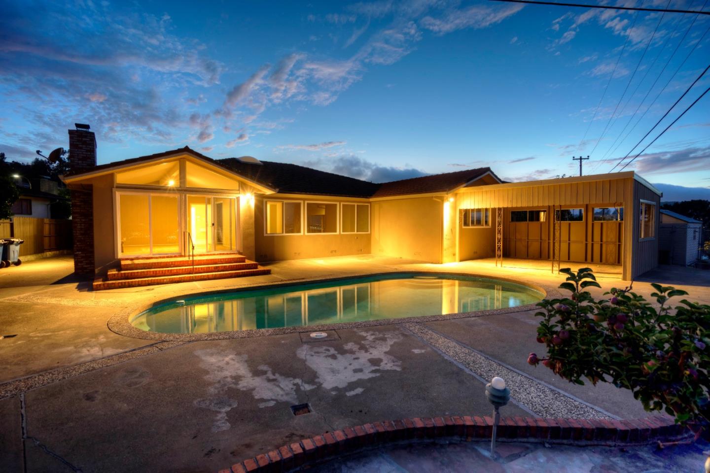 940 Ahwahnee Drive Millbrae, CA 94030 - Photo 25 of 29 a view of a house with a swimming pool