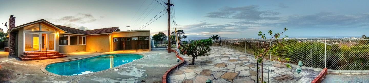 940 Ahwahnee Drive Millbrae, CA 94030 - Photo 26 of 29 a view of a house with a yard