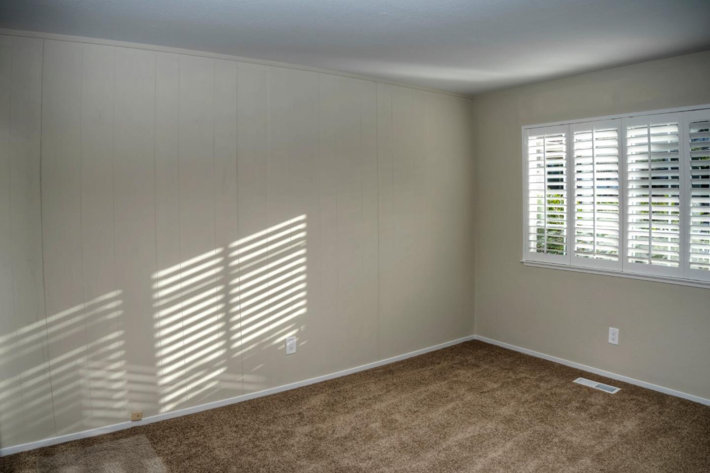 940 Ahwahnee Drive Millbrae, CA 94030 - Photo 4 of 29 an empty room with windows