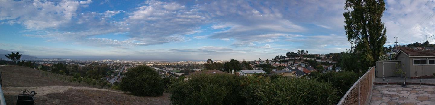 940 Ahwahnee Drive Millbrae, CA 94030 - Photo 8 of 29 a view of a city with lush green forest