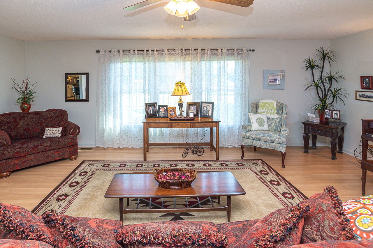 308 Jones Road Taft, TN 38488 - Photo 3 of 55 a living room with furniture and a chandelier