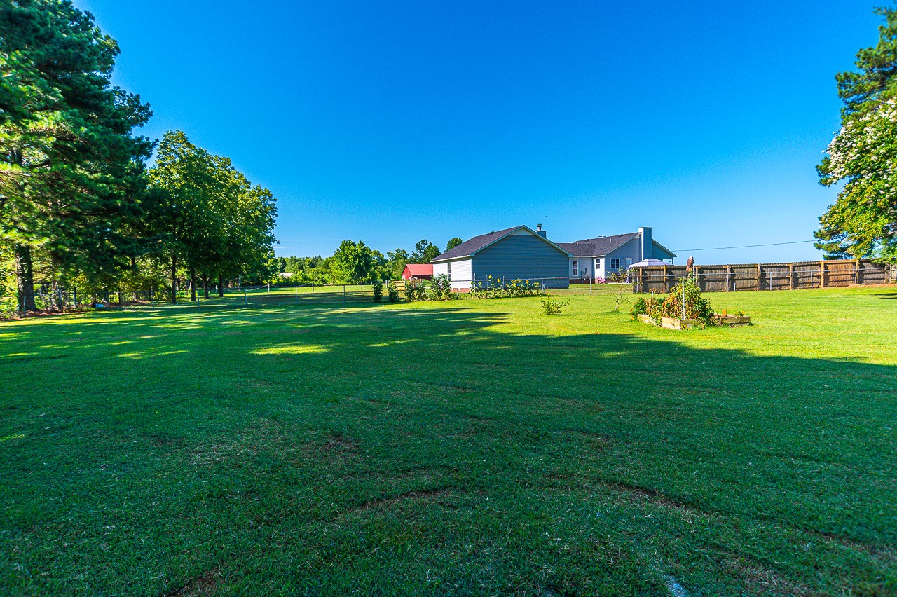 308 Jones Road Taft, TN 38488 - Photo 38 of 55 a view of a house with a big yard