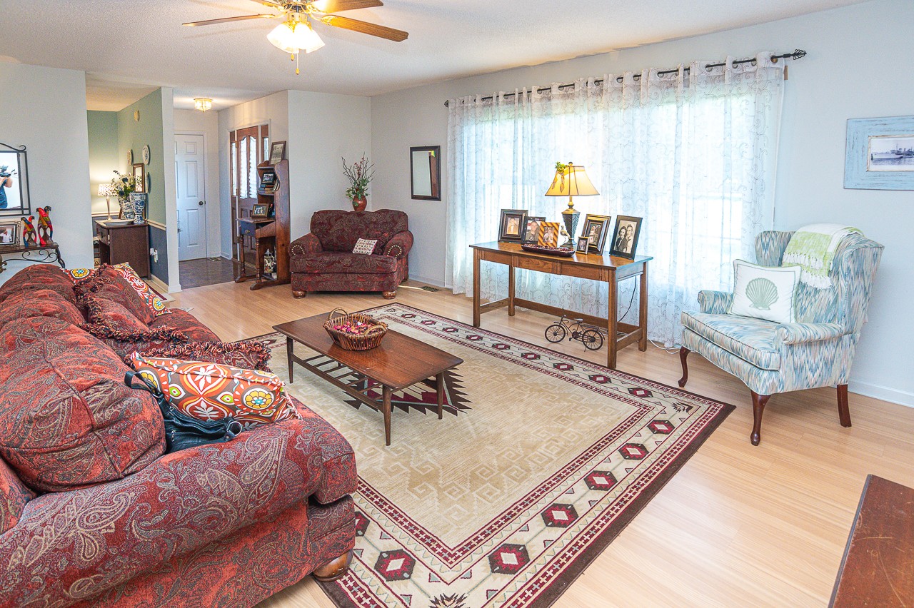 308 Jones Road Taft, TN 38488 - Photo 4 of 55 a living room with furniture and a chandelier