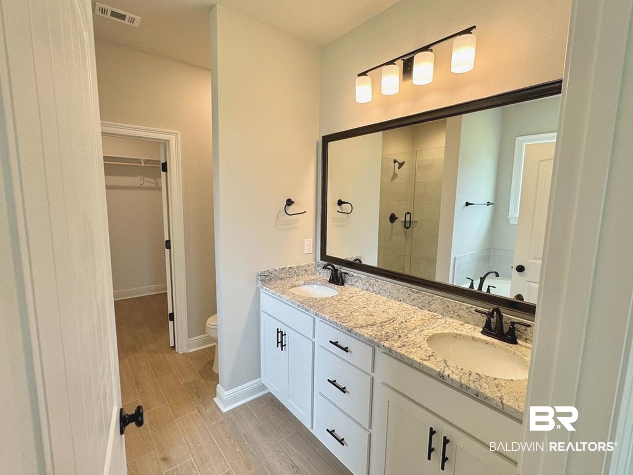 904 Sumter Loop Foley, AL 36535 - Photo 6 of 10 Full bathroom featuring independent shower and bath, toilet, and dual bowl vanity