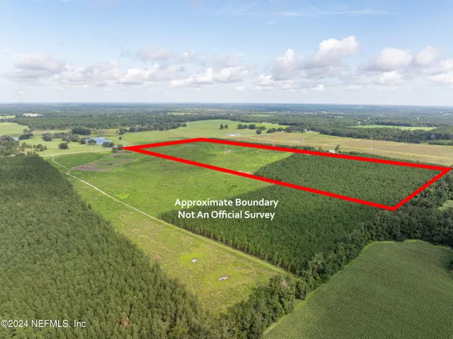 a view of an outdoor space and tennis court