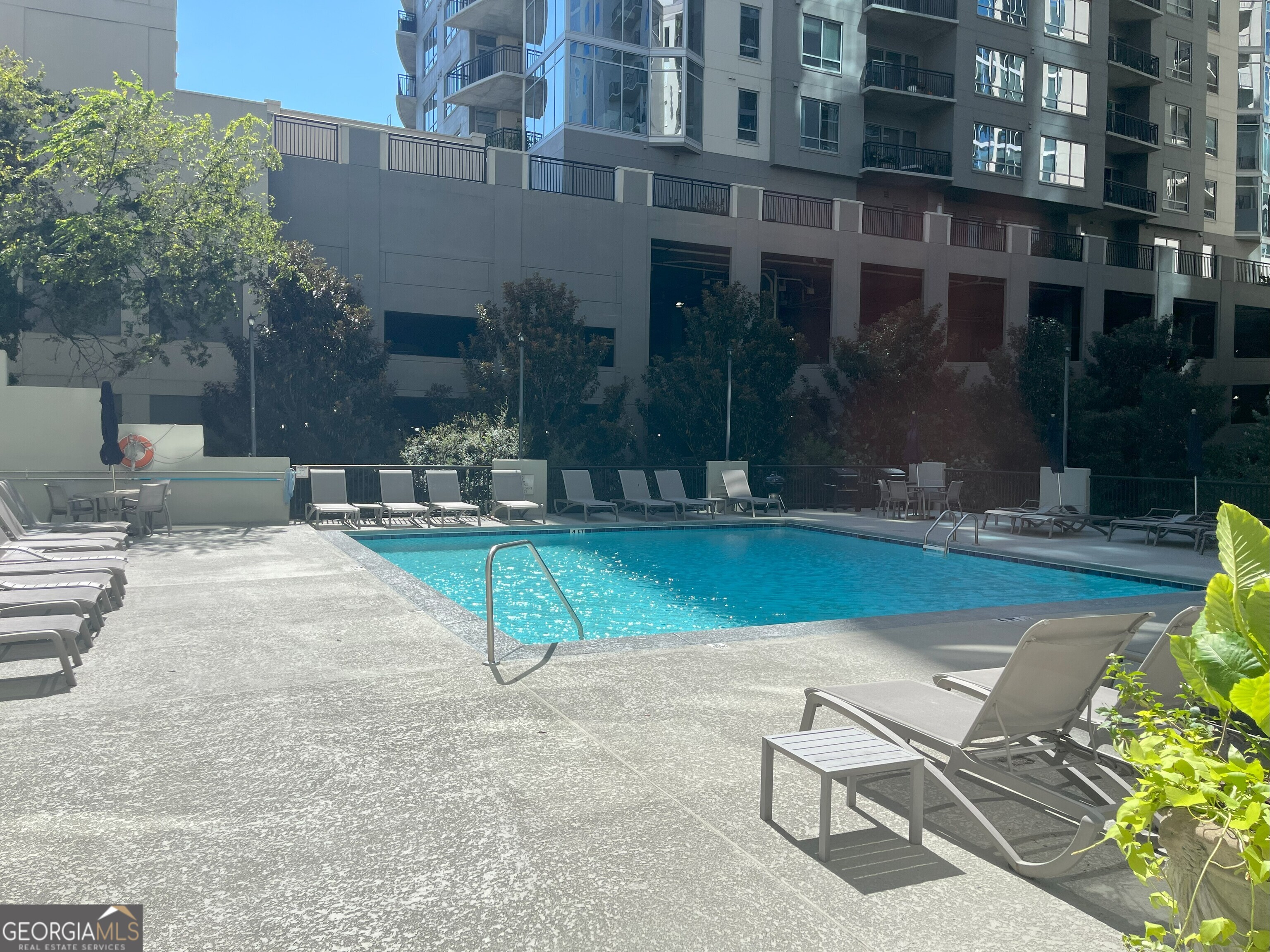 275 13th Street Northeast, Unit 605 Atlanta, GA 30309 - Photo 11 of 13 a view of backyard with outdoor seating