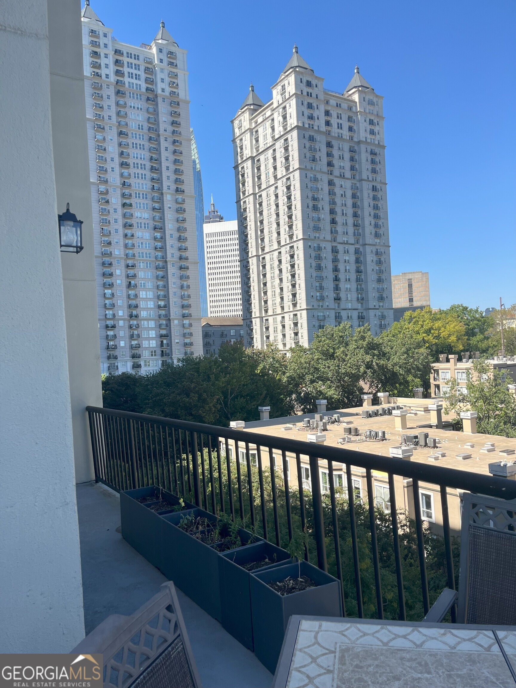 275 13th Street Northeast, Unit 605 Atlanta, GA 30309 - Photo 9 of 13 a view of balcony with a potted plant