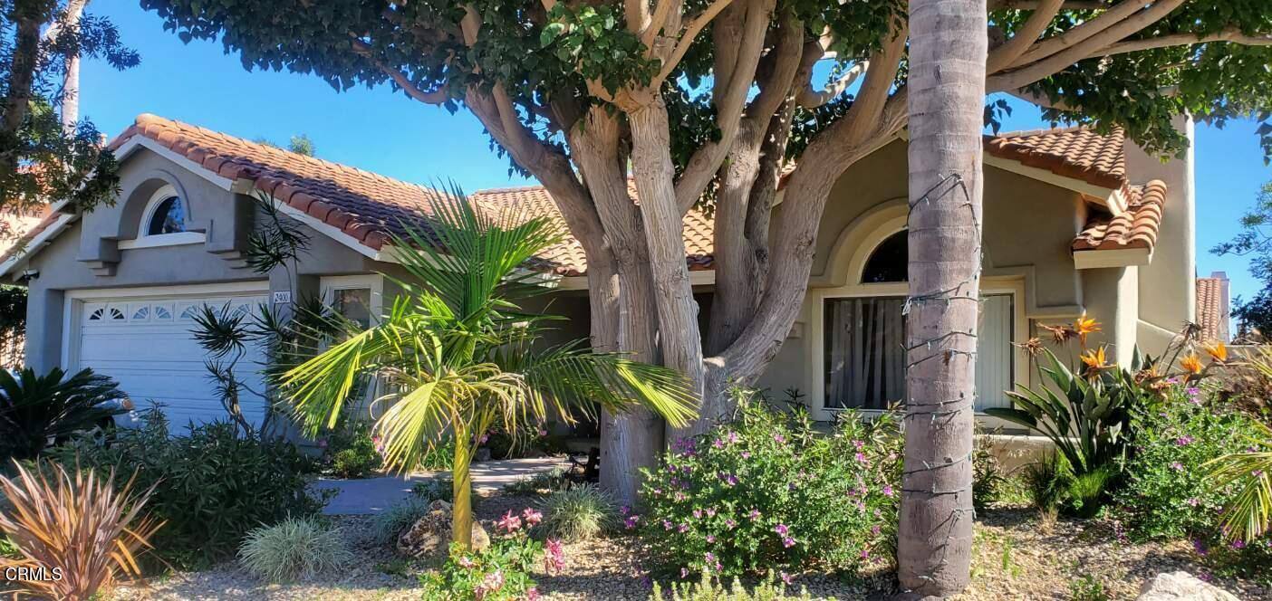 2400 Hillrose Place Oxnard, CA 93036 - Photo 2 of 13 a palm tree sitting in front of a house