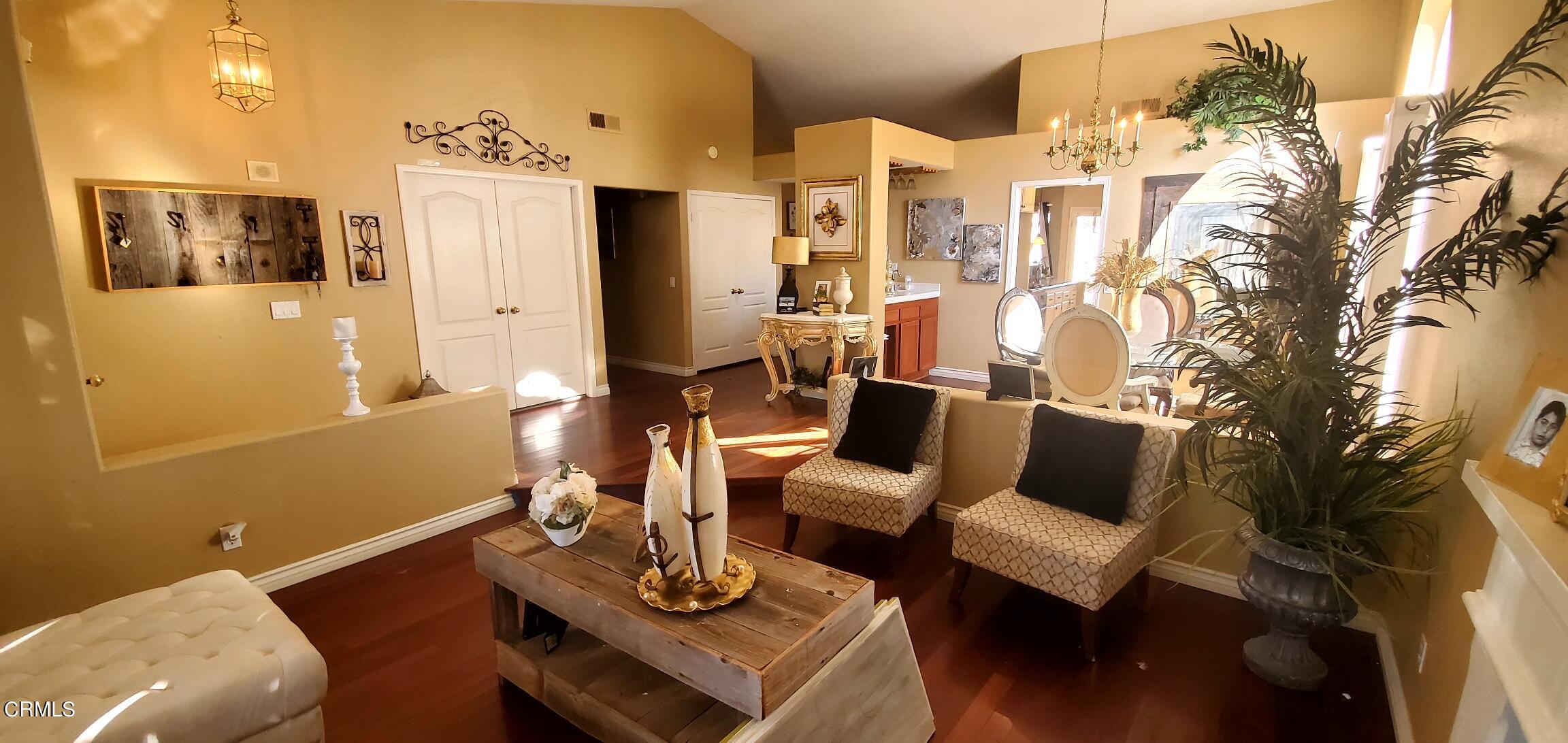 2400 Hillrose Place Oxnard, CA 93036 - Photo 7 of 13 a living room with furniture and wooden floor