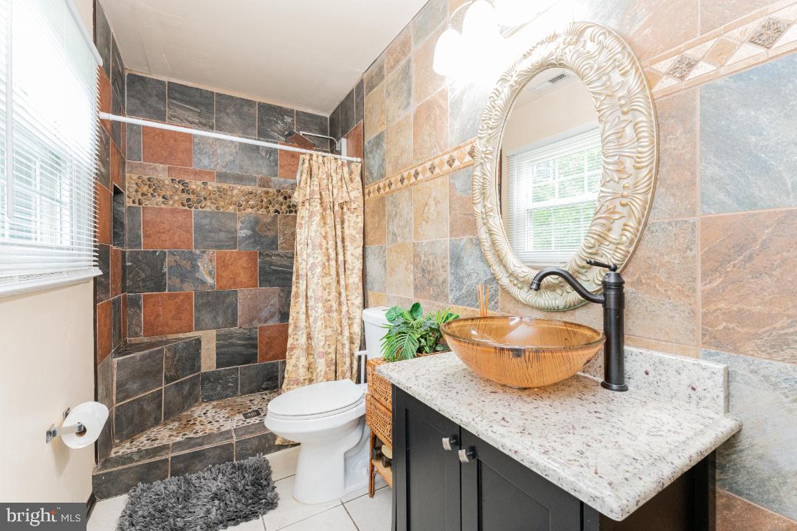 9201 Lawnview Lane Laurel, MD 20708 - Photo 23 of 49 Attached, Remodeled Primary Bath