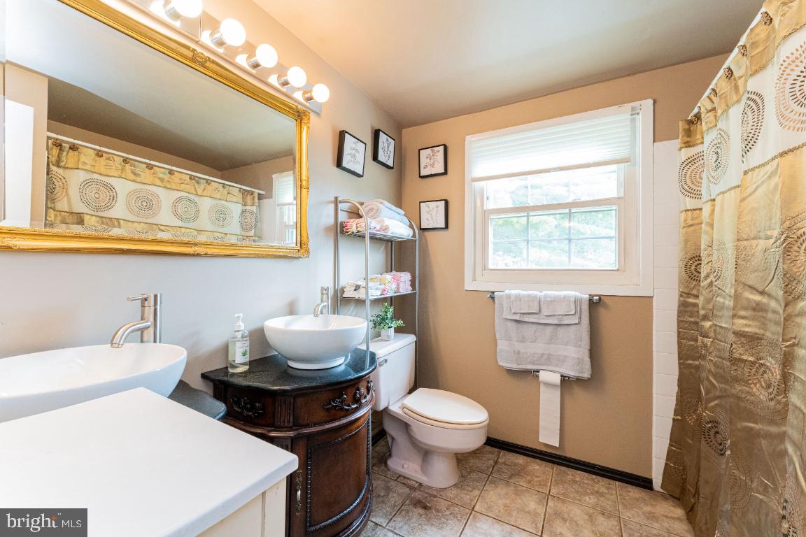 9201 Lawnview Lane Laurel, MD 20708 - Photo 33 of 49 Upper Level, Remodeled Bath