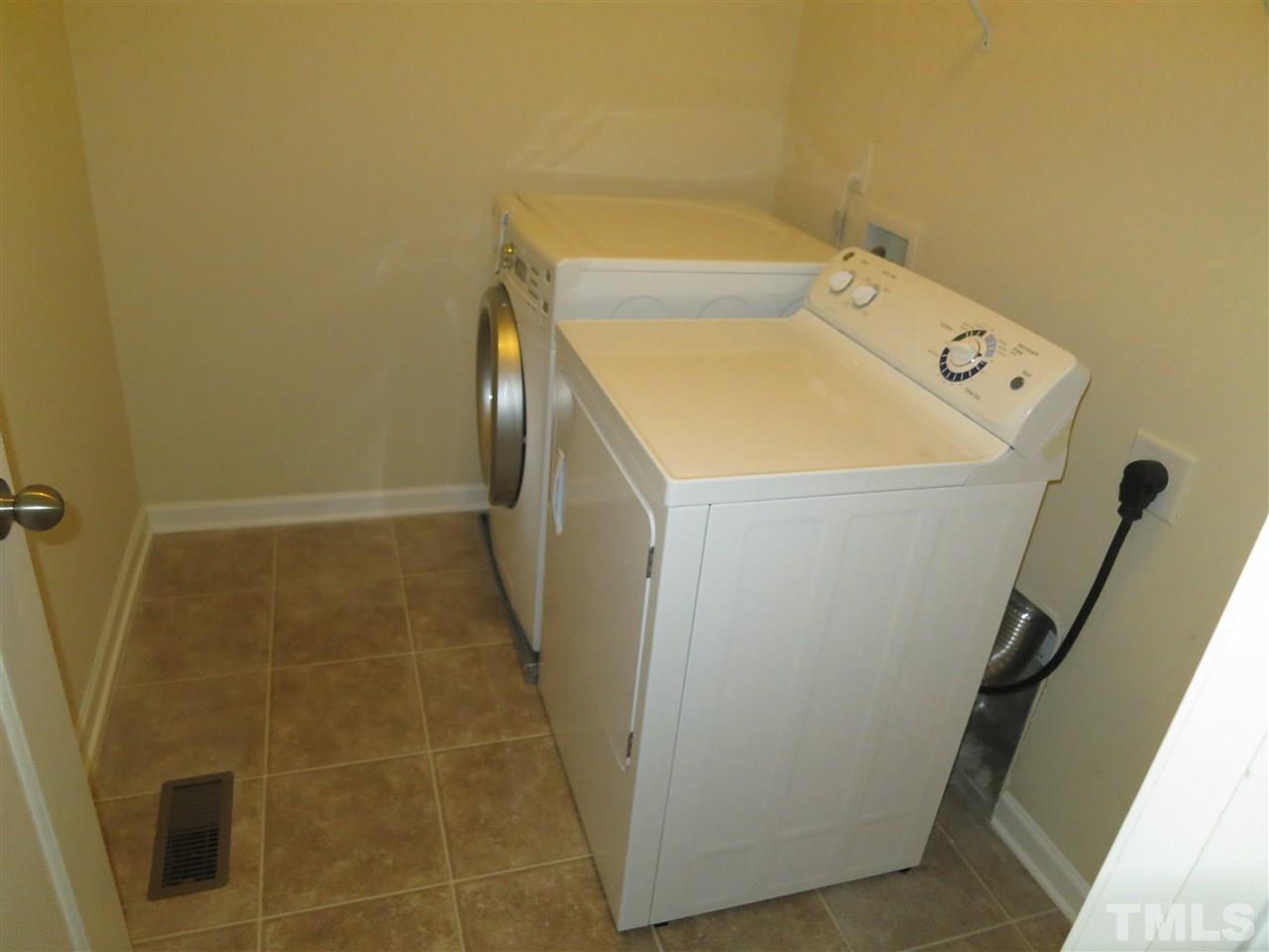 832 Davidson Point Road Cary, NC 27513 - Photo 14 of 18 a utility room with dryer and washer