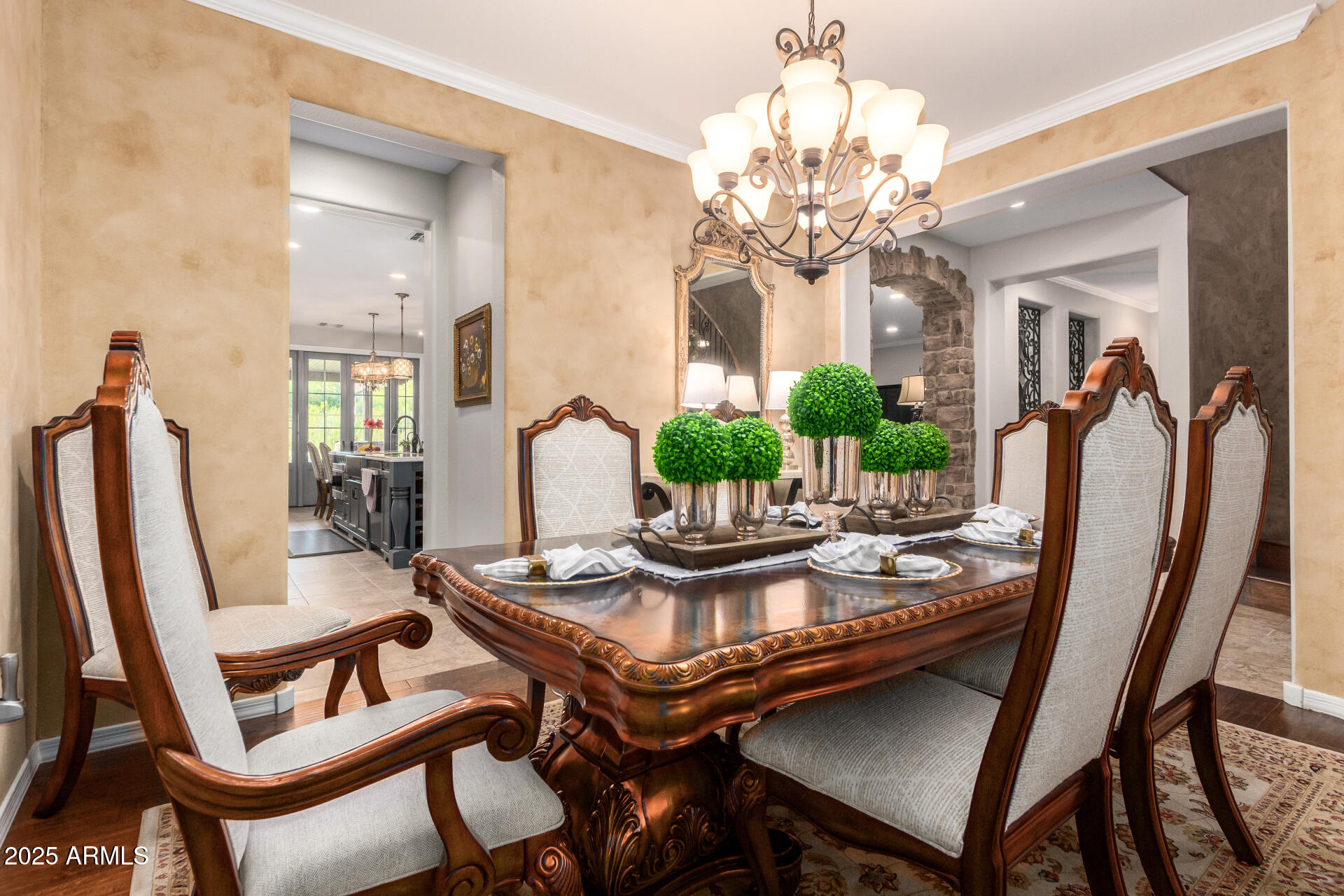 21626 North 38th Way Phoenix, AZ 85050 - Photo 16 of 72 a view of a dining room with furniture and a chandelier