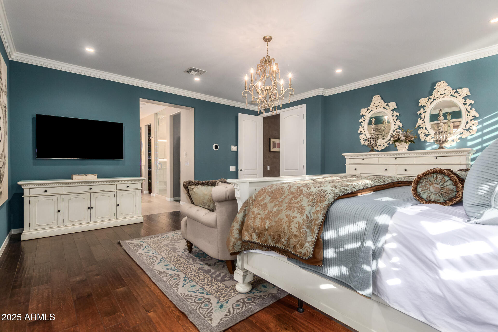 21626 North 38th Way Phoenix, AZ 85050 - Photo 23 of 72 a spacious bedroom with a bed and flat screen tv