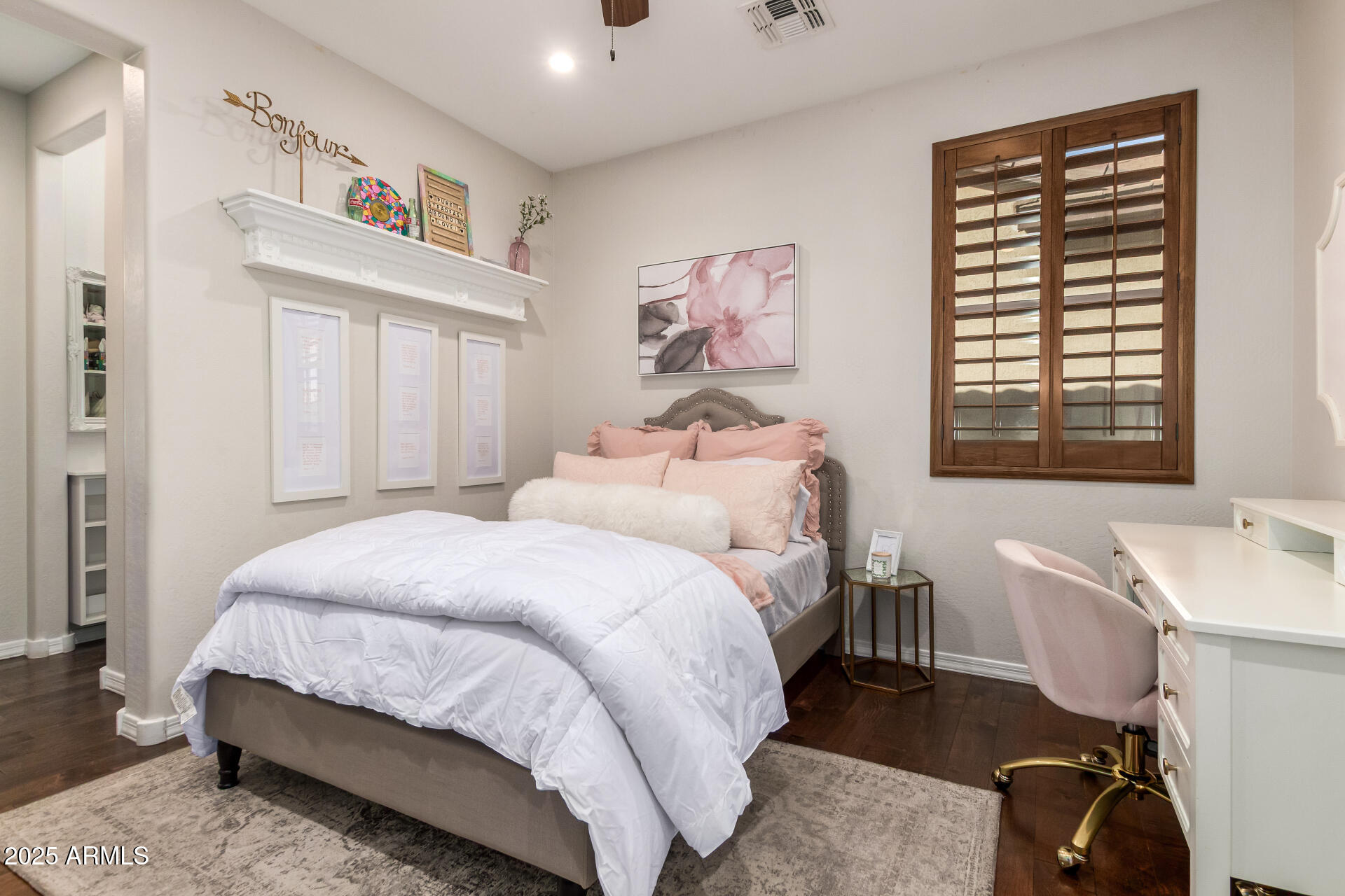 21626 North 38th Way Phoenix, AZ 85050 - Photo 29 of 72 a bedroom with a bed and a table in it